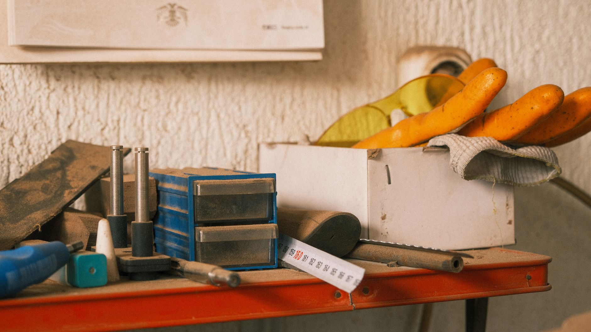 Collection of vintage tools on a wooden table indoors with a retro vibe. — 5 Tips on How to Choose a Door Handle for Your Fro